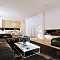 Brown-Modern-Living-Room-Design-with-Fireplace-by-PM-Studio
